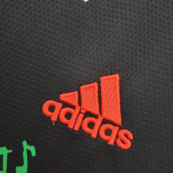 Camiseta “conmemorativa Bob Marley” Ajax