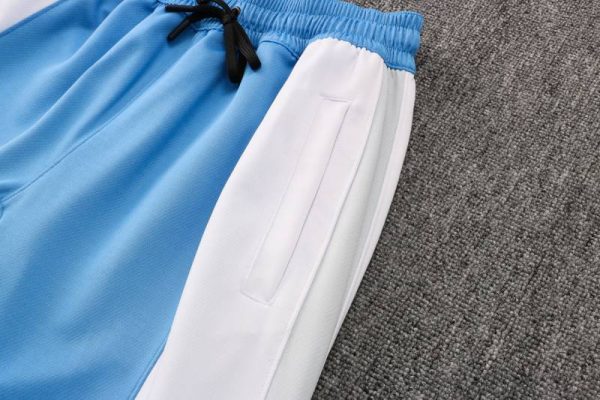Bolsillo de pantalon de Chandal Lakers azul claro con capucha