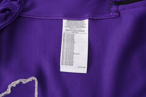 Etiqueta interior chandal lakers morado con capucha