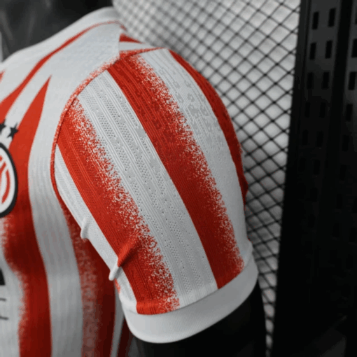 camiseta-inter-milan-rojo-version-jugador-2025-2026-puño-izquierdo